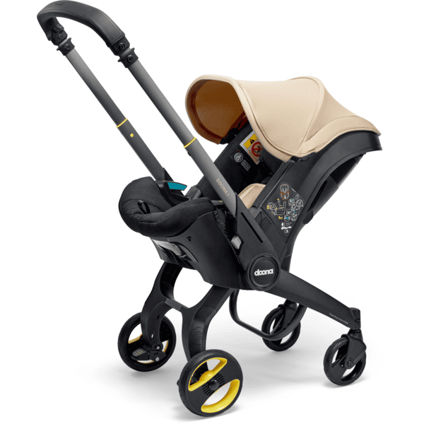 doona Babyschale Doona i Sahara Sand inklusive Basisstation doona i Isofix Räumungsverkauf