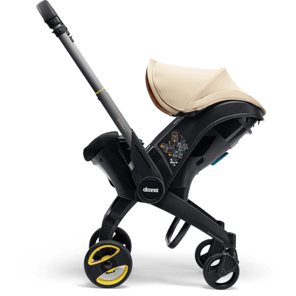 doona Babyschale Doona i Sahara Sand inklusive Basisstation doona i Isofix Räumungsverkauf